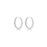 Fine jewellery, silver jewellery, hypoallergenic, tarnish-free, close up left view of a Pair of silver hoop earrings on a white background