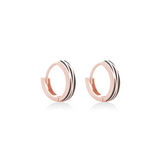 Fine jewellery, silver jewellery, hypoallergenic, tarnish-free, close-up right view of a pair of Rose gold hoop earrings with glazed black stripes on a white background