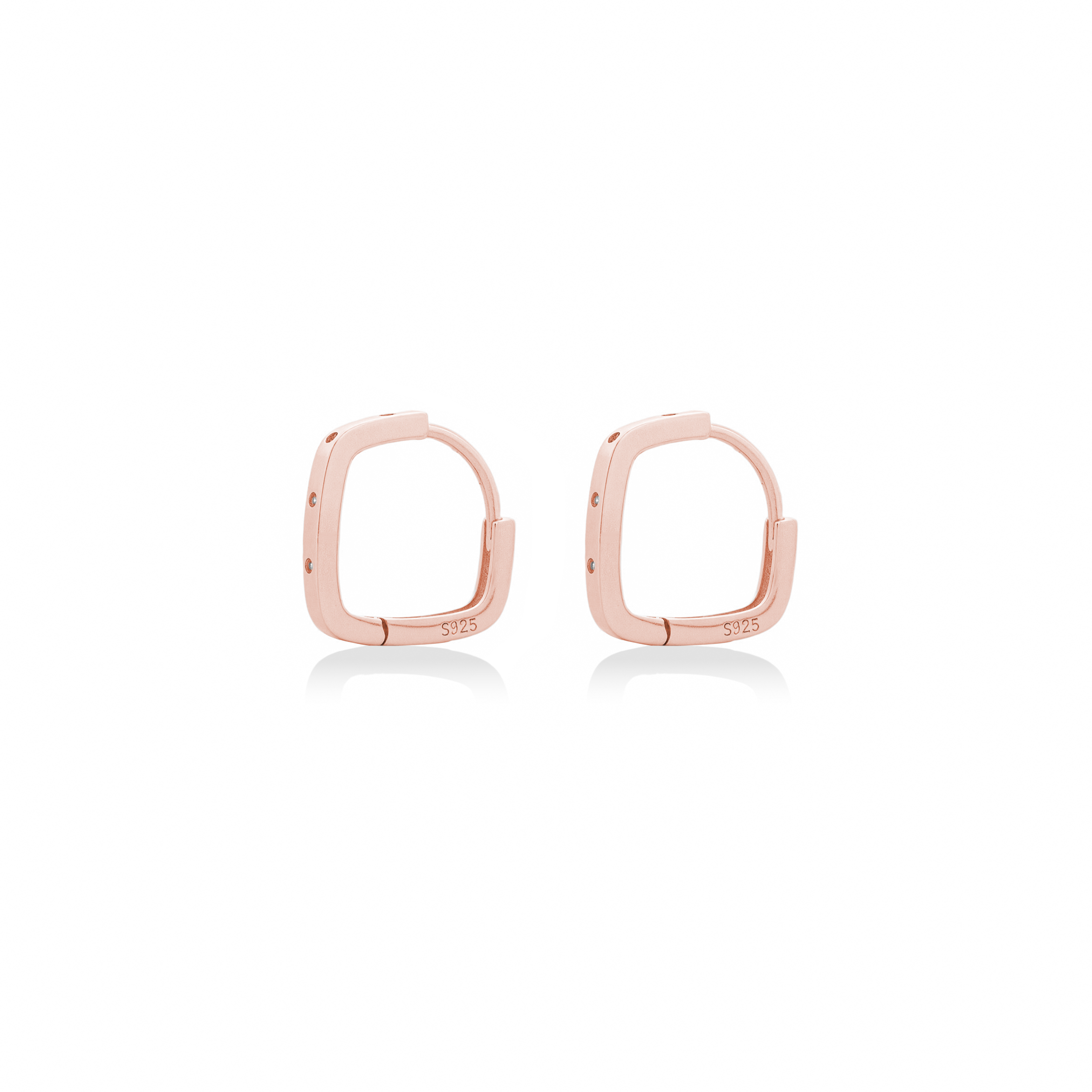 Fine jewellery, silver jewellery plated with rose gold, hypoallergenic, tarnish-free, close-up right view of a Pair of rose gold hoop earrings with crystals on a white background