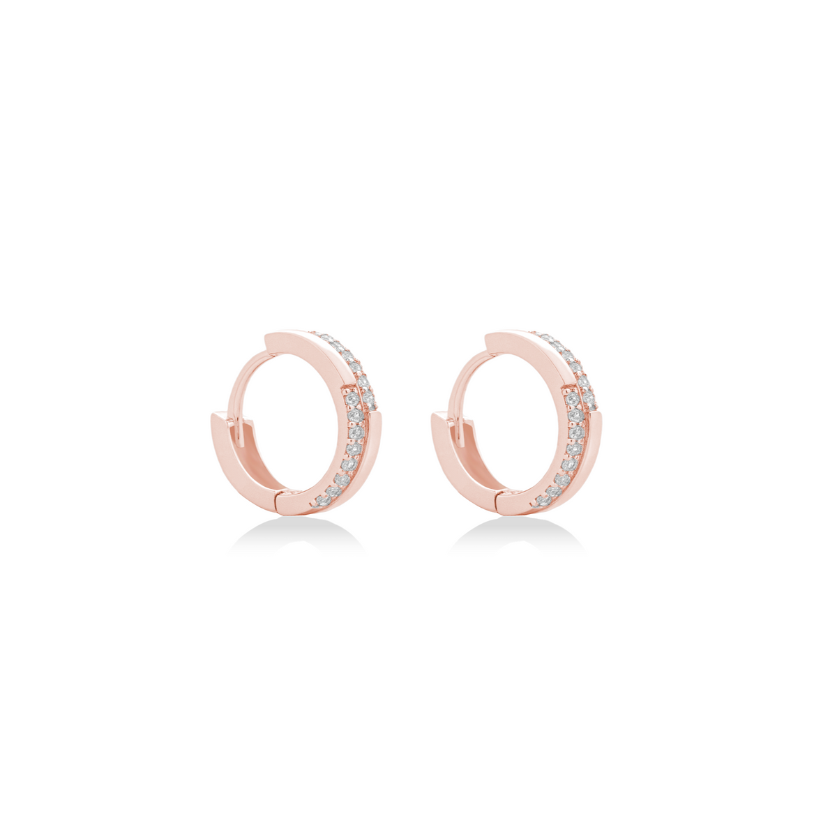 Fine jewellery, silver jewellery plated with rose gold, hypoallergenic, tarnish-free, close-up right view of a pair of Rose gold hoop earrings with embedded crystals on a white background