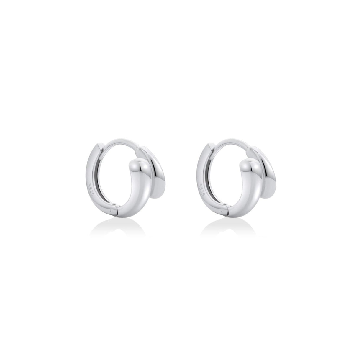 Fine jewellery, silver jewellery, hypoallergenic, tarnish-free,
close-up left view of a Pair of silver hoop earrings on a white background